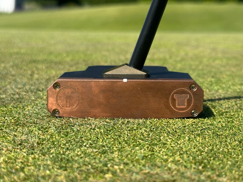 RFB Black Mallet copper face on a putting green